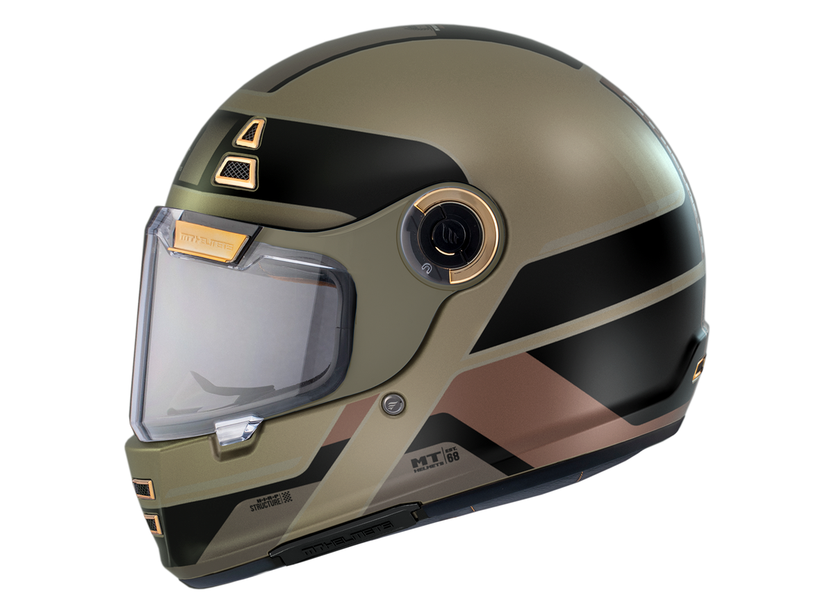 MT Helmets Integral Mc-Hjälm Jarama 68TH C9 Gold Matt i matt guld med svarta detaljer och aerodynamisk form. Idealisk för säker och bekväm motorcykelkörning.